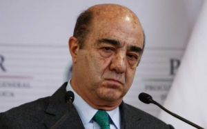 Vinculan a proceso a Murillo Karam por tres delitos en caso Ayotzinapa