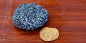 Encuentran moneda en el fondo del océano con valor de 2 mdp